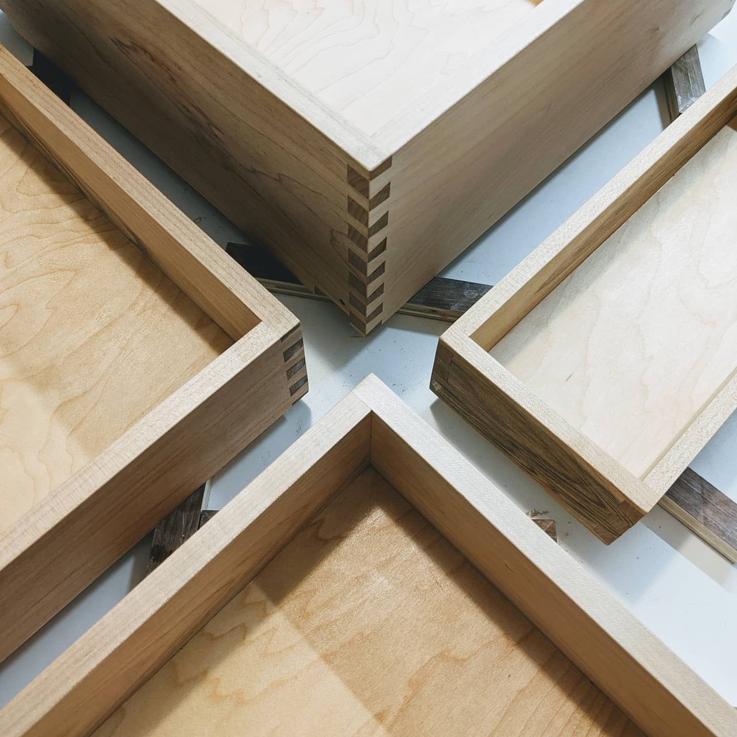 October 27th, 2020: Today, we took the completed dovetailed drawer boxes and finished them with shellac. Two more coats and they'll be ready for delivery!